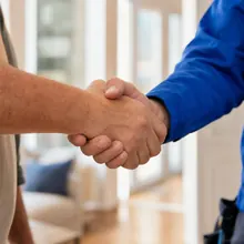 Handshake between a homeowner and a technician